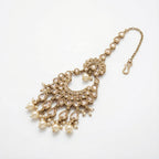 Ivory Heirloom Crescent Tikka detail showing pear-cut crystal chain, kundan crescent, and pearl fringe