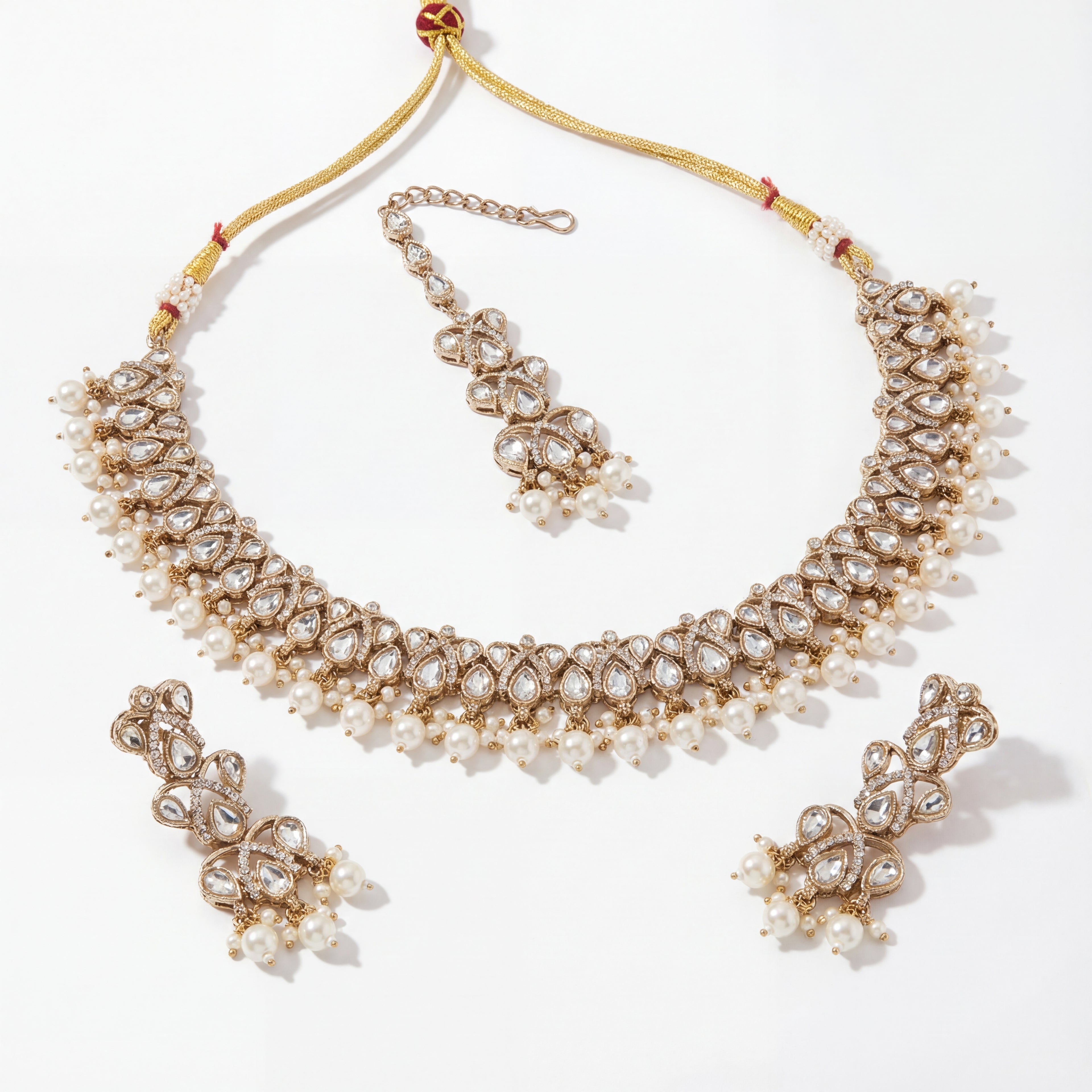 Sitara Pearl Polki Set detail of teardrop polki stones and pearl fringe