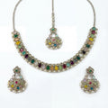 Studio flatlay of the polki necklace set with matching earrings.