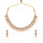 Rajasi Pearl Polki Necklace Set antique gold choker with pearl drops and matching earrings