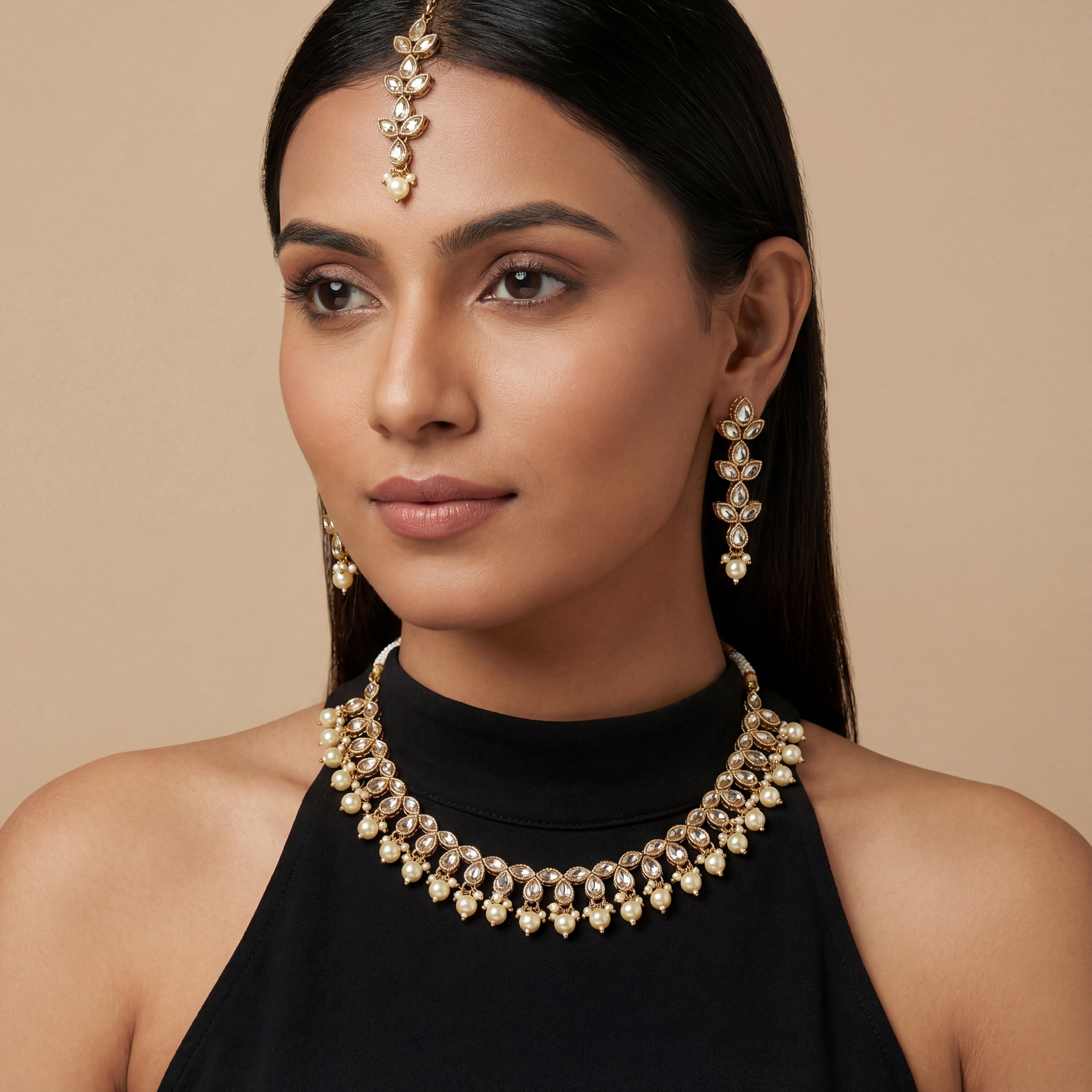 South Asian woman wearing the ivory pearl necklace set — bridal look.