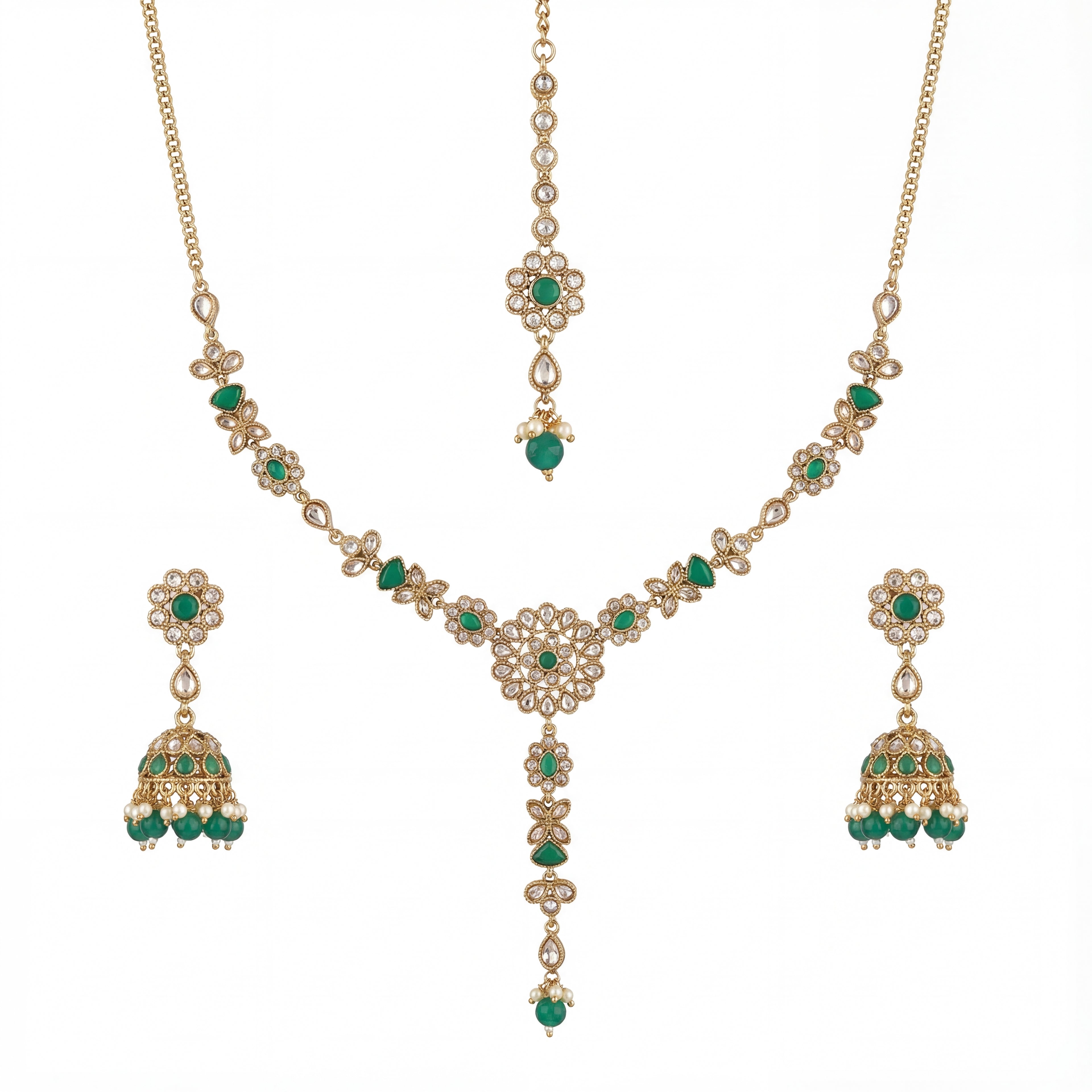 Studio flatlay of the emerald heirloom necklace set with matching earrings.