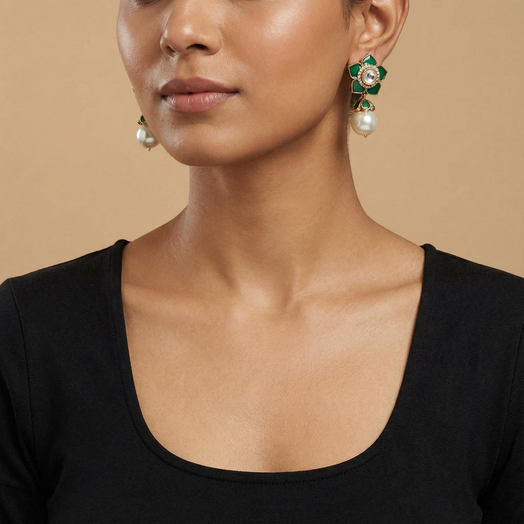 Close-up of Emerald Floral Pearl Earrings showing floral detailing and pearl accents and gold-plated finish