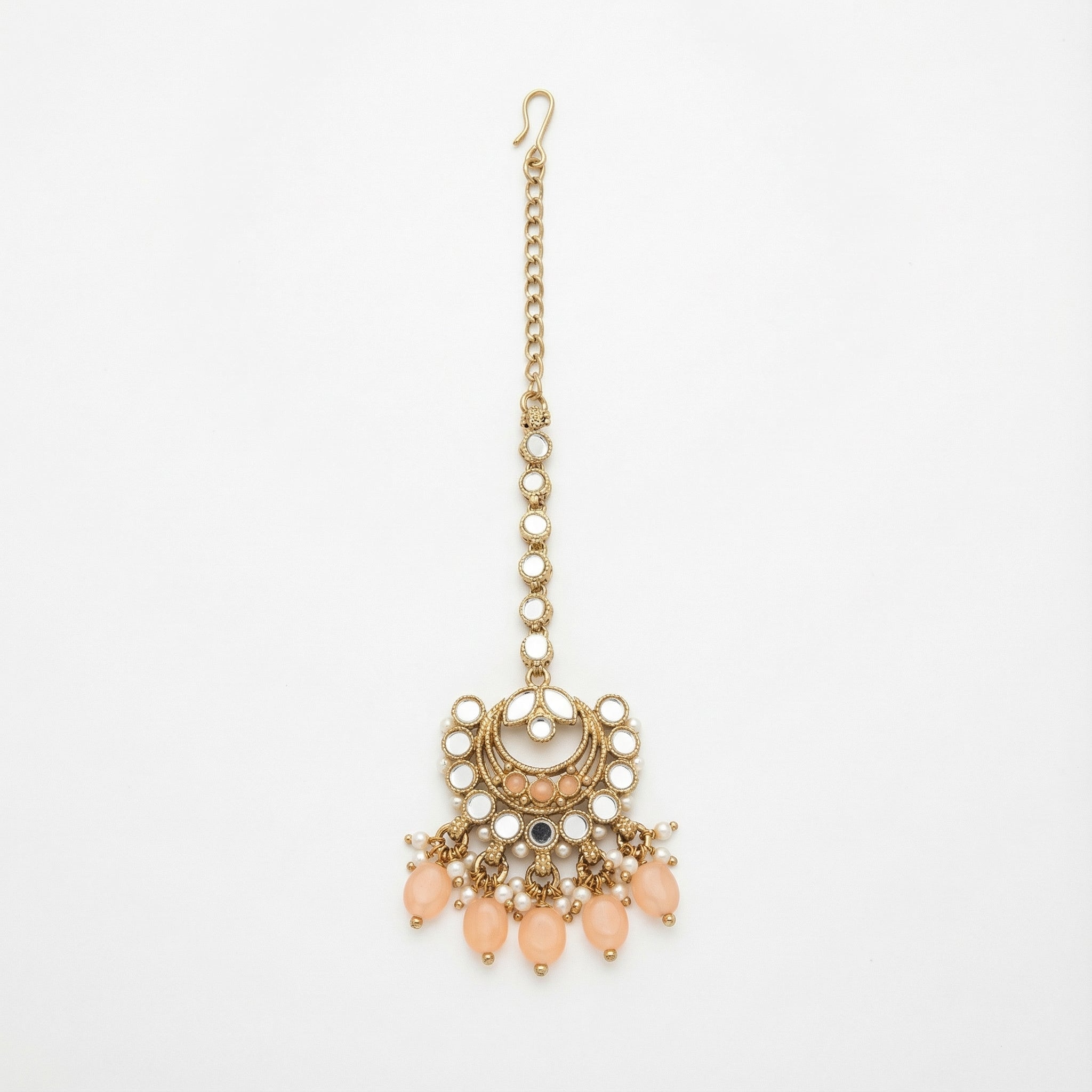 Ziya Crescent Tikka gold maang tikka with mirror kundan links and peach crescent pendant on gray background
