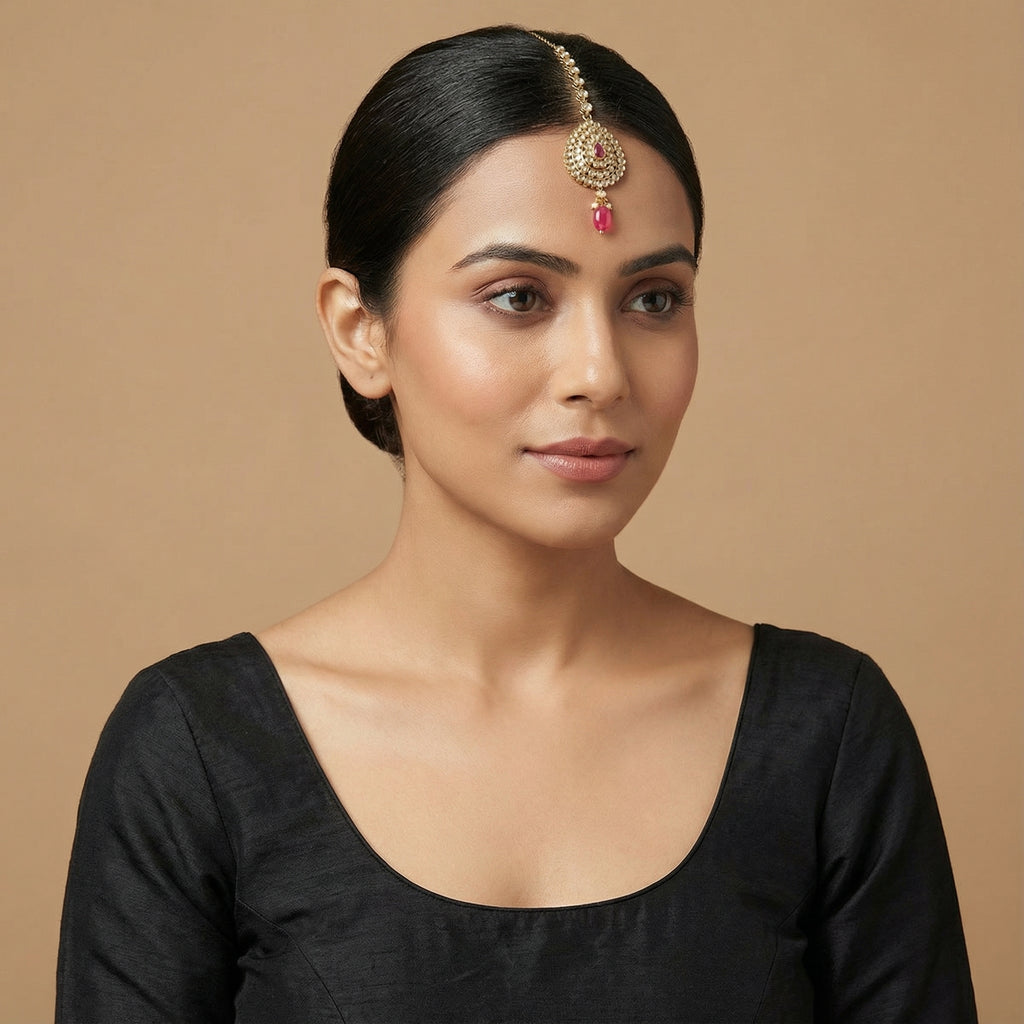 Mehru Ruby Medallion Tikka detail showing pavé teardrop medallion and pink oval dangle