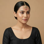 Mehru Ruby Medallion Tikka detail showing pavé teardrop medallion and pink oval dangle