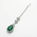 Zayna Emerald Statement Tikka detail showing stacked crystal circles and green pear center stone