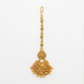 Anika Temple Drop Tikka antique gold-tone temple maang tikka with beaded fringe on gray background