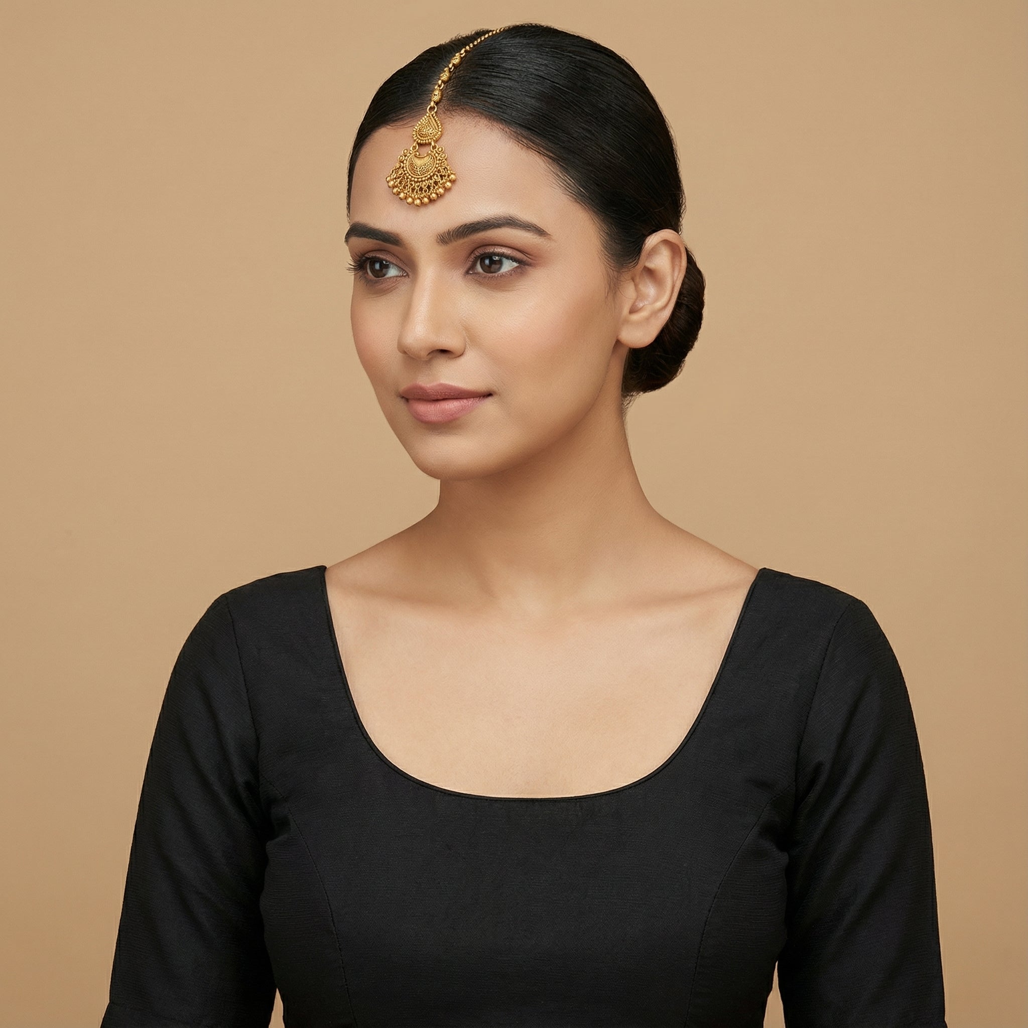 Anika Temple Drop Tikka detail of embossed crescent pendant and granulated teardrop tier