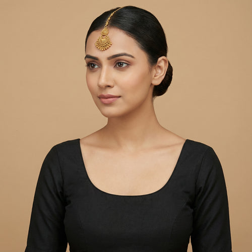 Anika Temple Drop Tikka detail of embossed crescent pendant and granulated teardrop tier