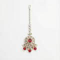 Saffiya Ruby Polki Tikka silver polki maang tikka with red center and red bead pearl fringe on gray background
