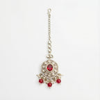 Saffiya Ruby Polki Tikka silver polki maang tikka with red center and red bead pearl fringe on gray background
