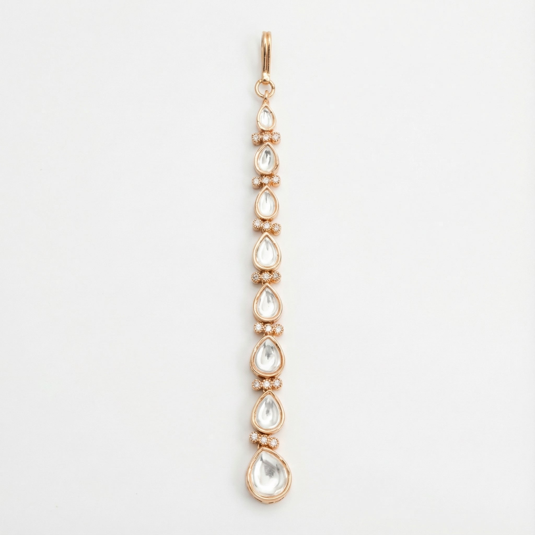 Luma Teardrop Tikka gold linear maang tikka with graduated clear teardrop stones