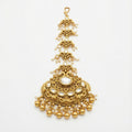 Chandrika Pearl Crest Tikka gold-tone kundan maang tikka with pearl fringe on gray background