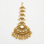 Chandrika Pearl Crest Tikka gold-tone kundan maang tikka with pearl fringe on gray background