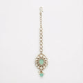 Serene Mint Halo Tikka silver kite maang tikka with mint green center on gray background