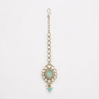 Serene Mint Halo Tikka silver kite maang tikka with mint green center on gray background