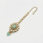 Serene Mint Halo Tikka detail showing crystal border, mint oval stone, and green pearl drop cluster
