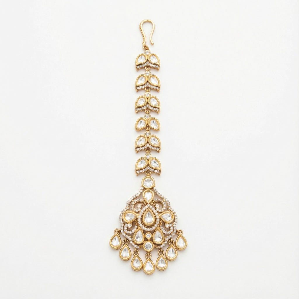 Aranya Polki Chandelier Tikka gold chandelier maang tikka with polki pendant and teardrop charms on gray background