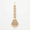 Aranya Polki Chandelier Tikka gold chandelier maang tikka with polki pendant and teardrop charms on gray background