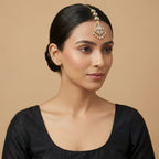 Aranya Polki Chandelier Tikka detail showing leaf-link polki chain, filigree center, and seven crystal drops