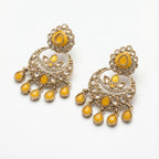 Haldi Crest Statement Earrings detail showing crescent lotus panel and yellow teardrop fringe