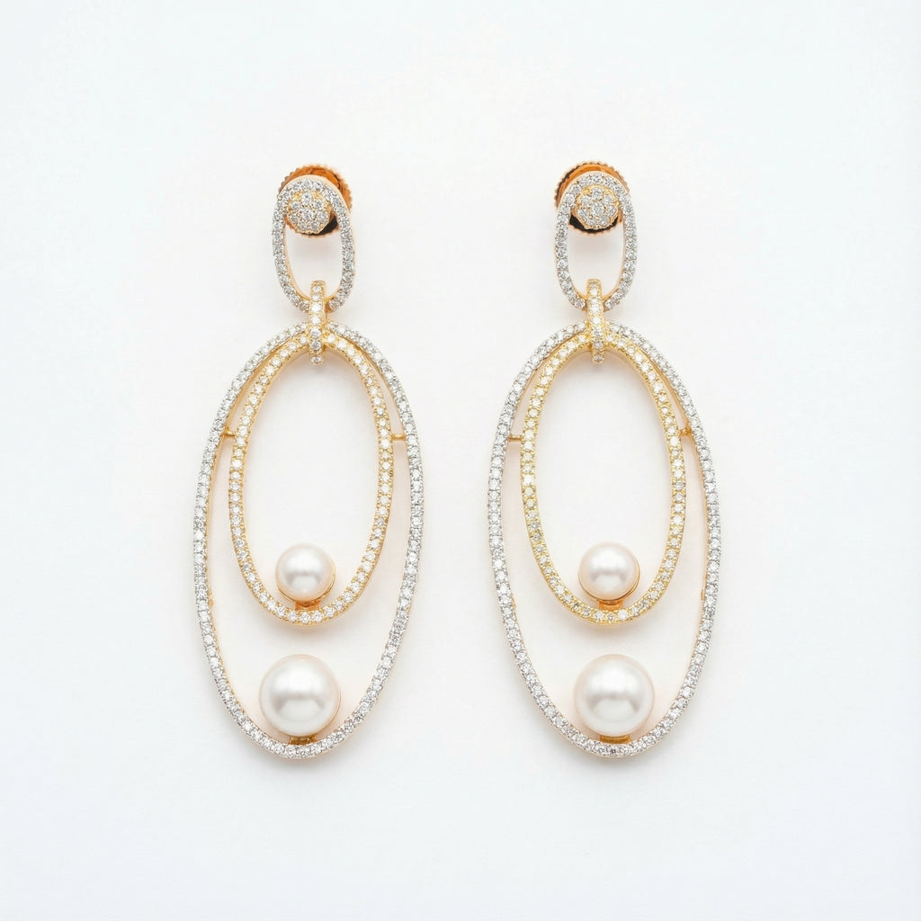 Orbitline Drop Earrings two-tone nested oval drops with pavé crystals and pearls on white background