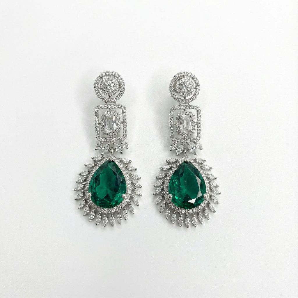 Elowen Emerald Descent Earrings rhodium emerald pear drops with marquise halo