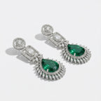 Elowen Emerald Descent Earrings detail showing sunburst marquise border and green teardrop