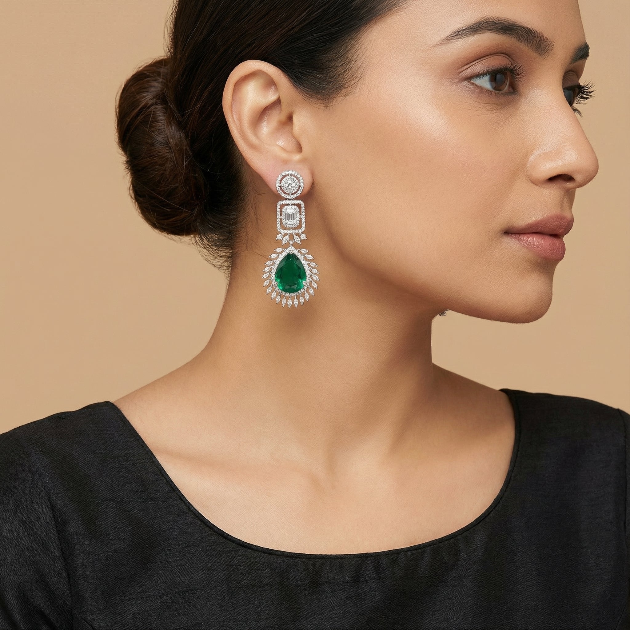 Elowen Emerald Descent Earrings detail showing sunburst marquise border and green teardrop