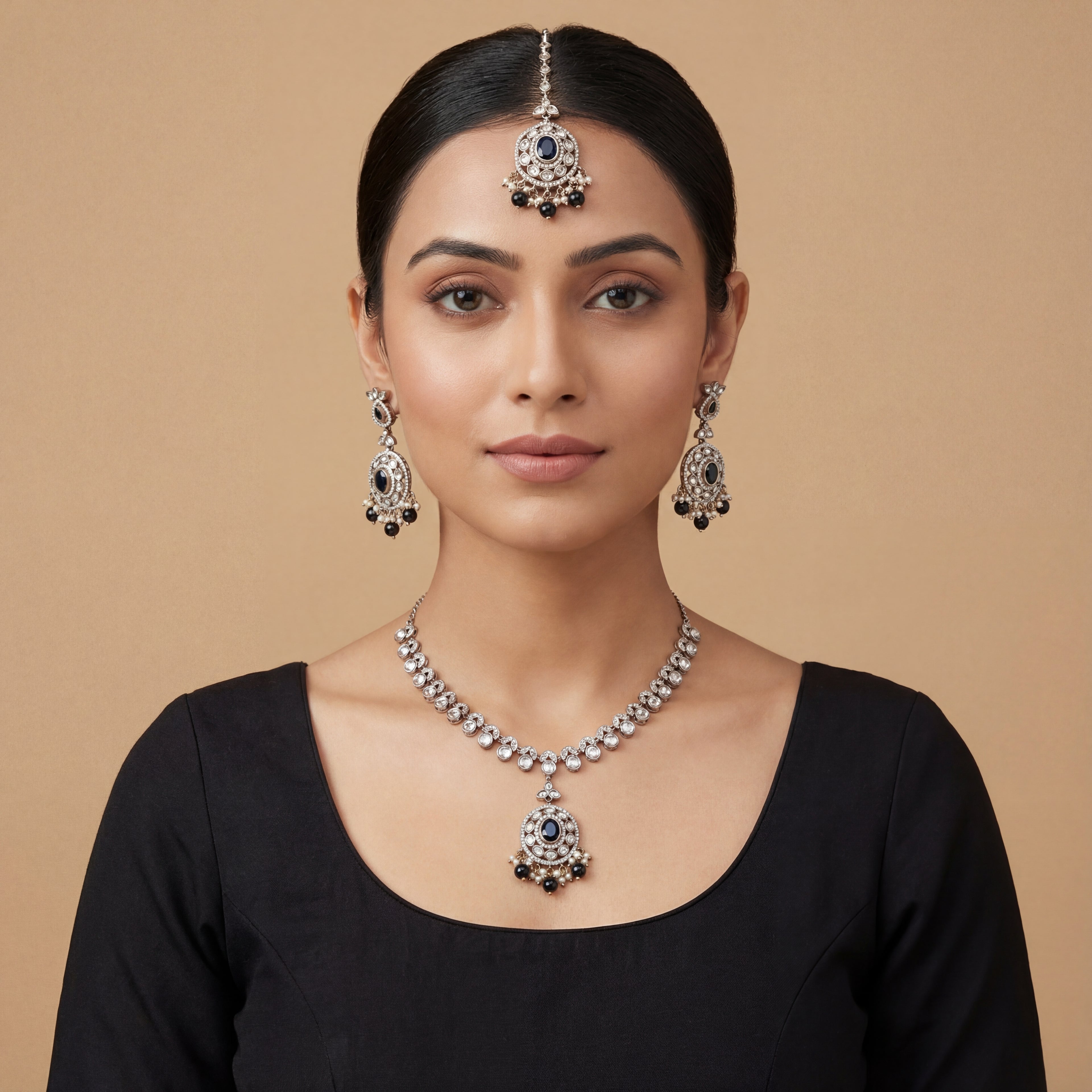 Eclipse Polki Necklace Set detail showing black oval center stones and pearl-and-bead fringe