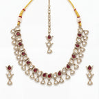 Ruby Veil Polki Necklace Set antique gold collar with ruby teardrops, earrings, and tikka