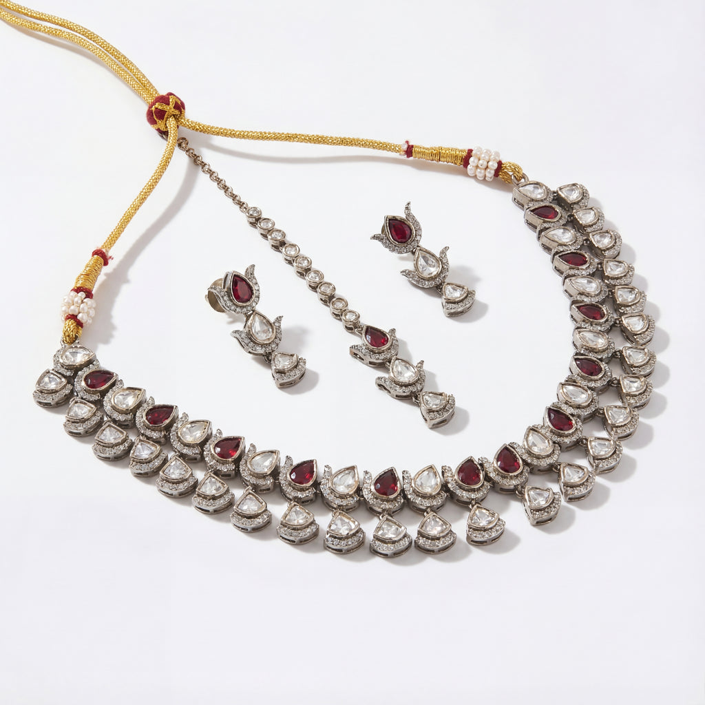 Ruby Veil Polki Necklace Set detail of ruby and clear polki teardrop motifs
