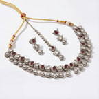 Ruby Veil Polki Necklace Set detail of ruby and clear polki teardrop motifs