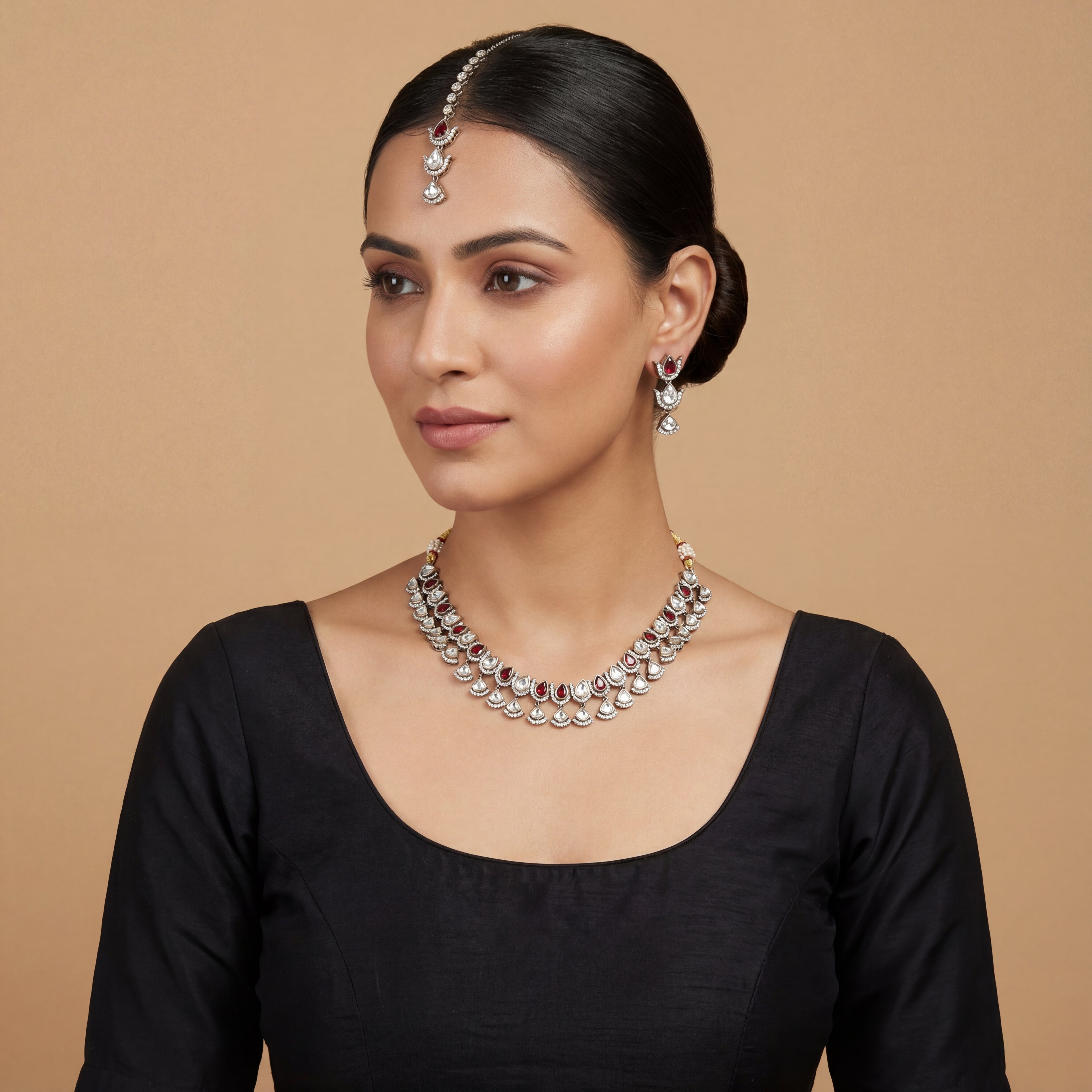 Ruby Veil Polki Necklace Set detail of ruby and clear polki teardrop motifs