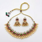 Rangrez Emerald Polki Necklace Set gold floral polki choker with jhumka earrings