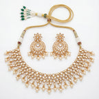 Anmol Floral Polki Necklace Set gold floral polki bib with chandbali earrings on white background