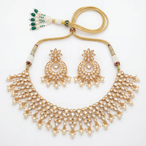 Anmol Floral Polki Necklace Set gold floral polki bib with chandbali earrings on white background