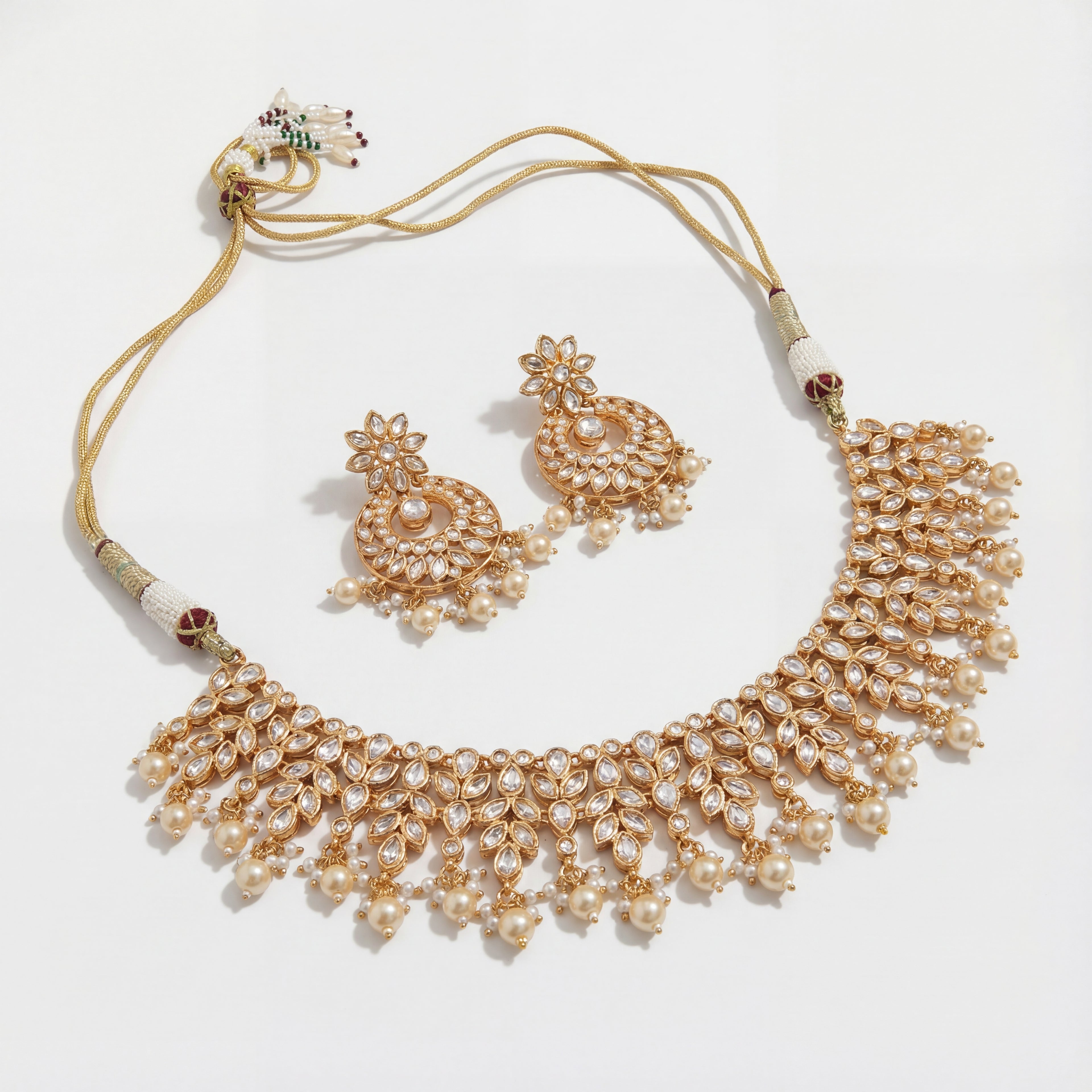 Anmol Floral Polki Necklace Set detail showing teardrop stone leaves and pearl fringe