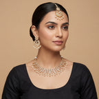 Anmol Floral Polki Necklace Set detail showing teardrop stone leaves and pearl fringe