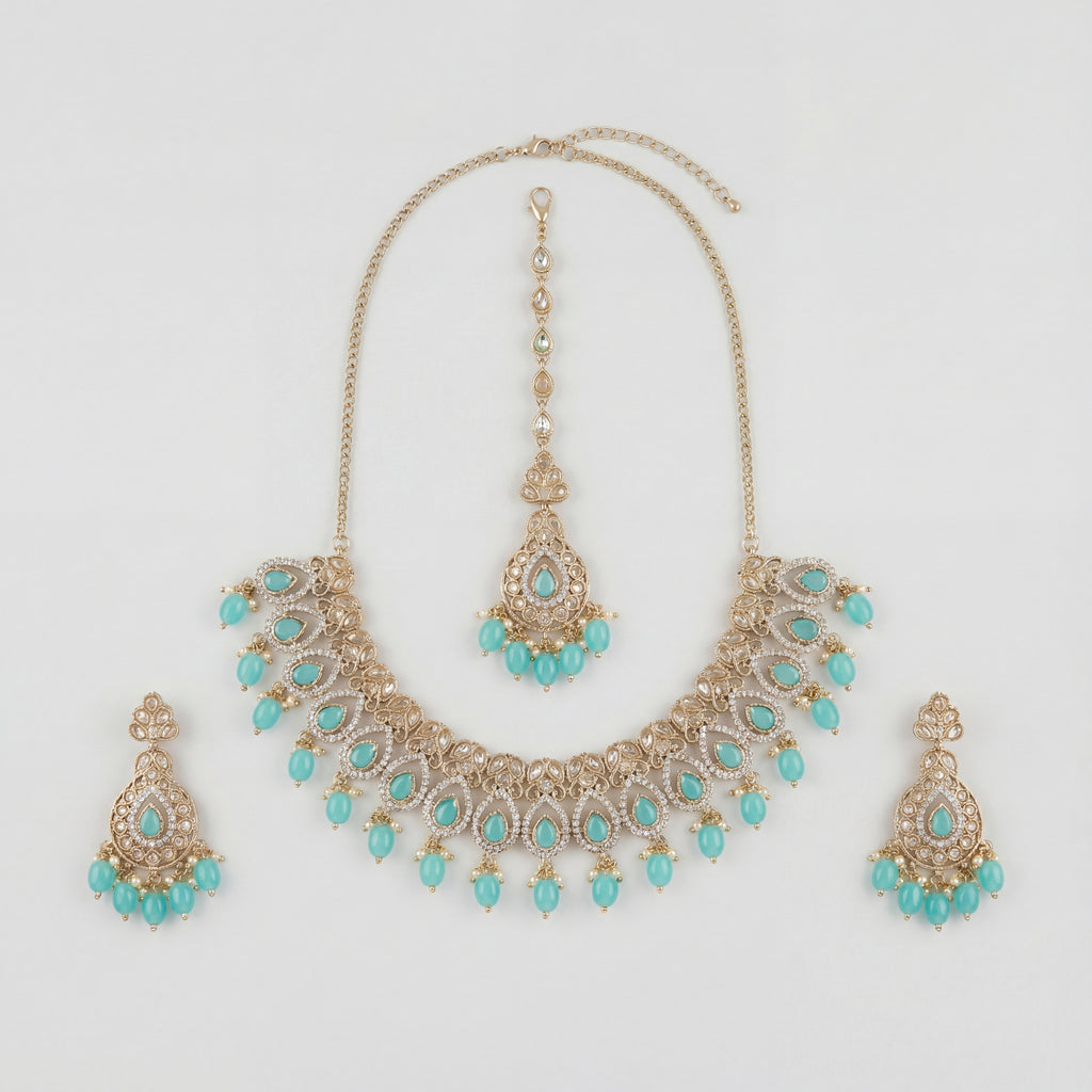 Chandni Aqua Polki Necklace Set with turquoise teardrop stones, earrings, and maang tikka