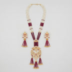 Shahi Ruby Polki Grand Necklace Set gold Rani haar with ruby beads and polki pendant on gray background