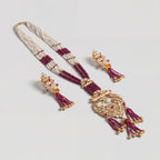 Shahi Ruby Polki Grand Necklace Set detail showing pearl and ruby strands and pendant tassels