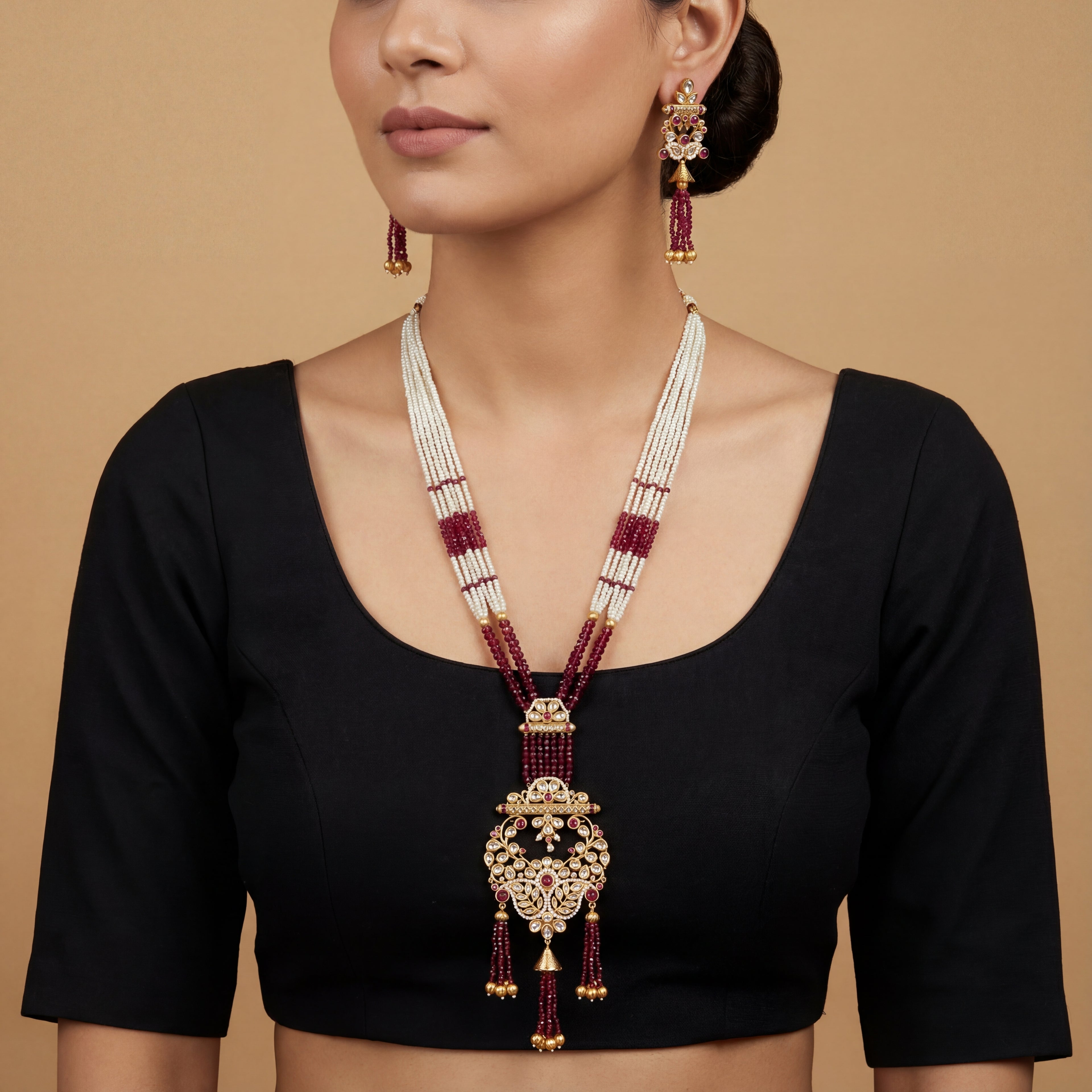 Shahi Ruby Polki Grand Necklace Set detail showing pearl and ruby strands and pendant tassels