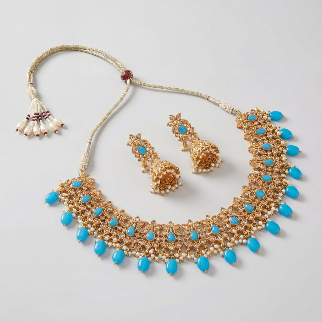 Saaya Blue Statement Necklace Set gold bib necklace and earring detail