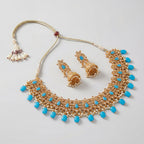 Saaya Blue Statement Necklace Set gold bib necklace and earring detail