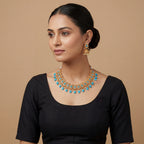 Saaya Blue Statement Necklace Set gold bib necklace and earring detail