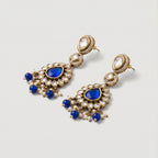 Close-up of Royal Neelam Pearl Earrings showing pearl accents and gold-plated finish