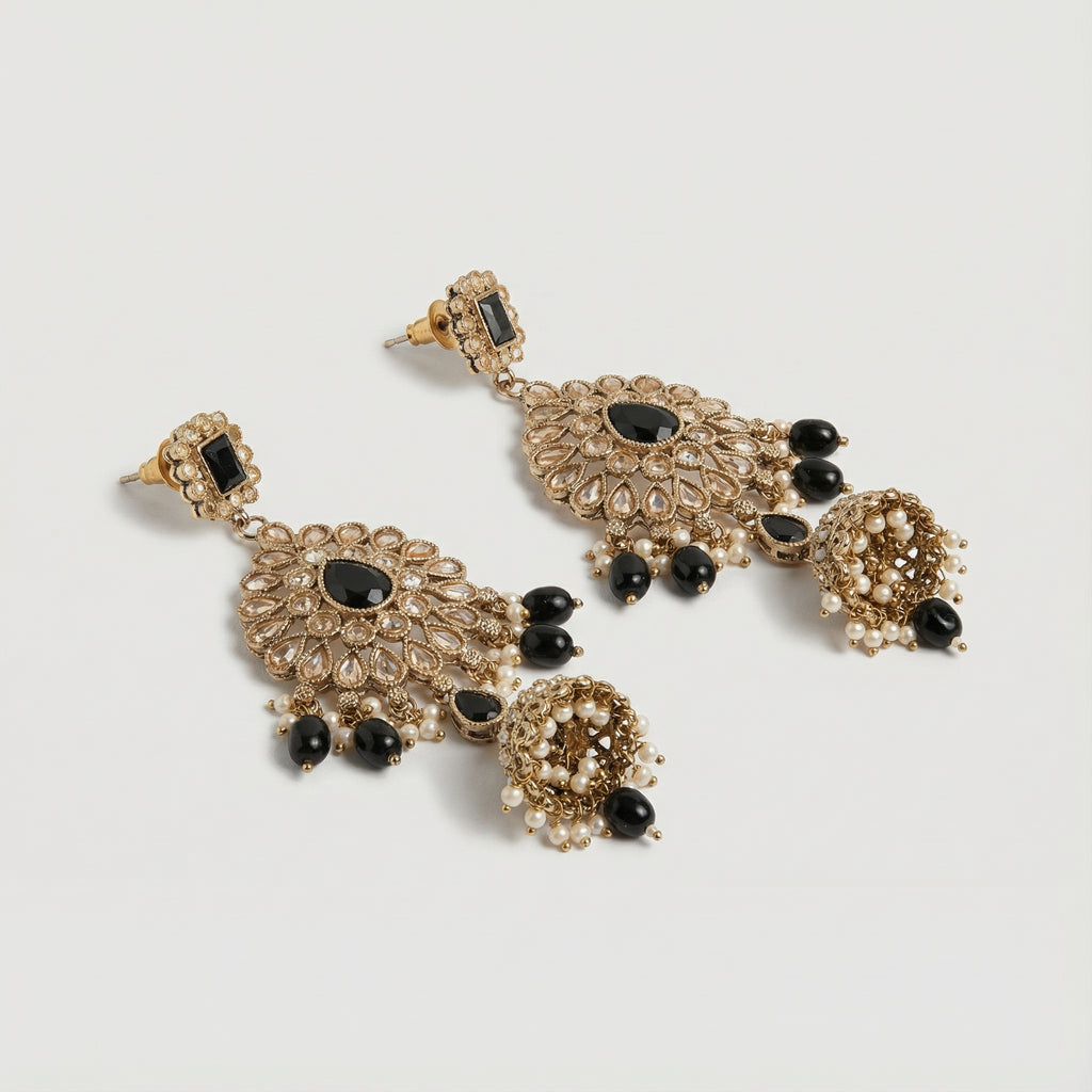 Onyx Noor Jhumka Earrings detail showing filigree sunburst panel and pearl-lined bell