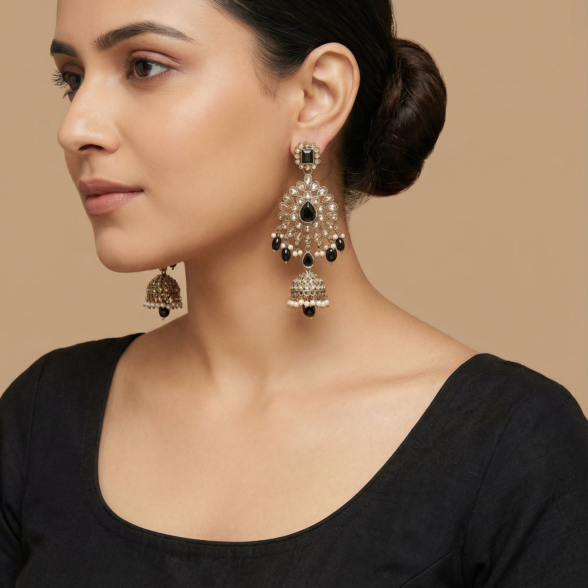 Onyx Noor Jhumka Earrings detail showing filigree sunburst panel and pearl-lined bell